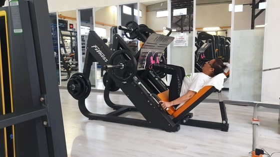 Macchina di stampa per le gambe per l'allenamento della forza commerciale con carico medio e selezione del carico dei pin